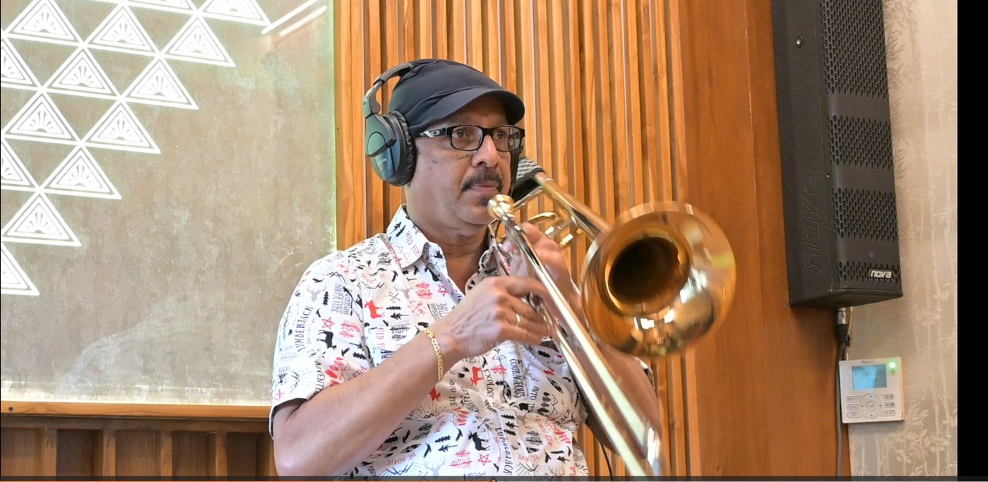 Trombone player recording remotely for Shehnai Funk