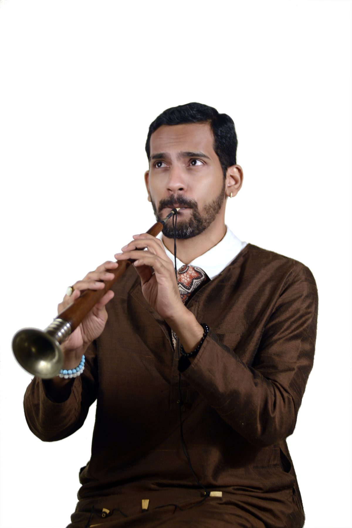 Omkar Dhumal portrait with Shehnai